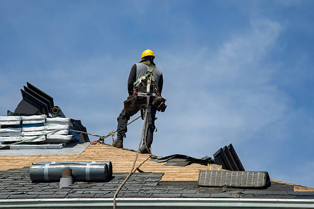 Professional Roof Replacement technician working in Aquebogue, NY